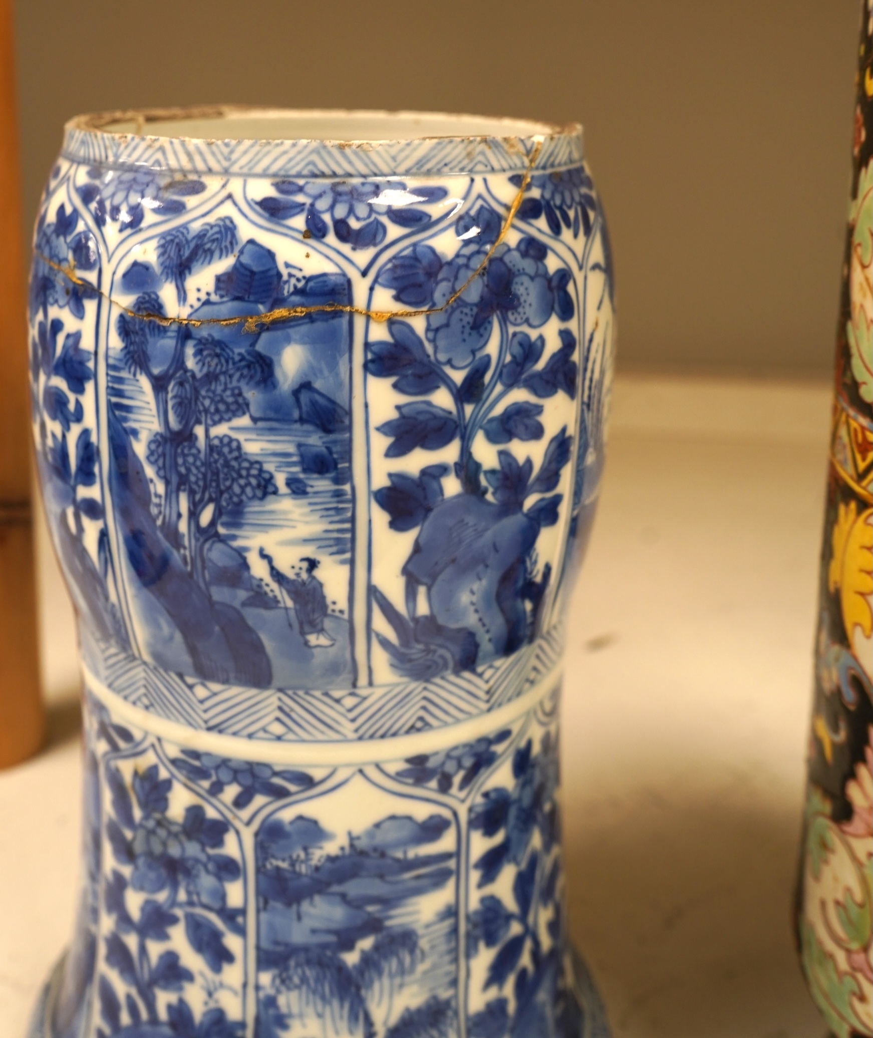 A Chinese Kangxi blue and white vase (cut down gu vase), 26cm high and a Chinese Bencharong famille rose vase